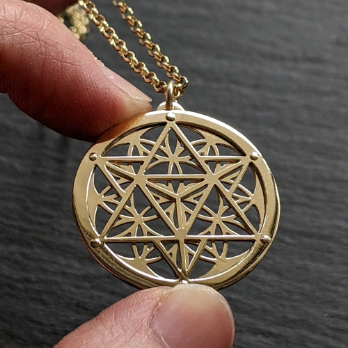 Handcut 9ct gold Star Seed Pendant