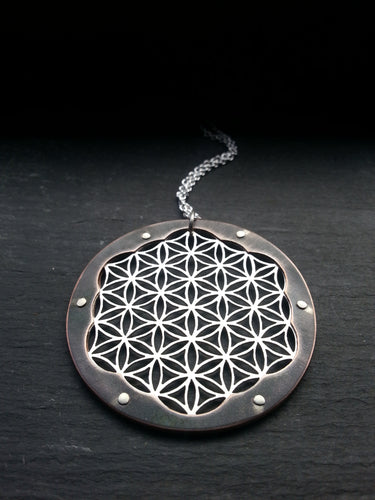 Handcut Flower of Life Pendant - triple layer with oxidised copper border