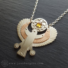 Handcut Egyptian Horus Pendant - holding citrine seed of life