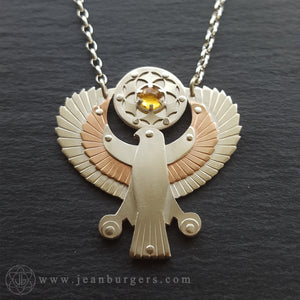 Handcut Egyptian Horus Pendant - holding citrine seed of life